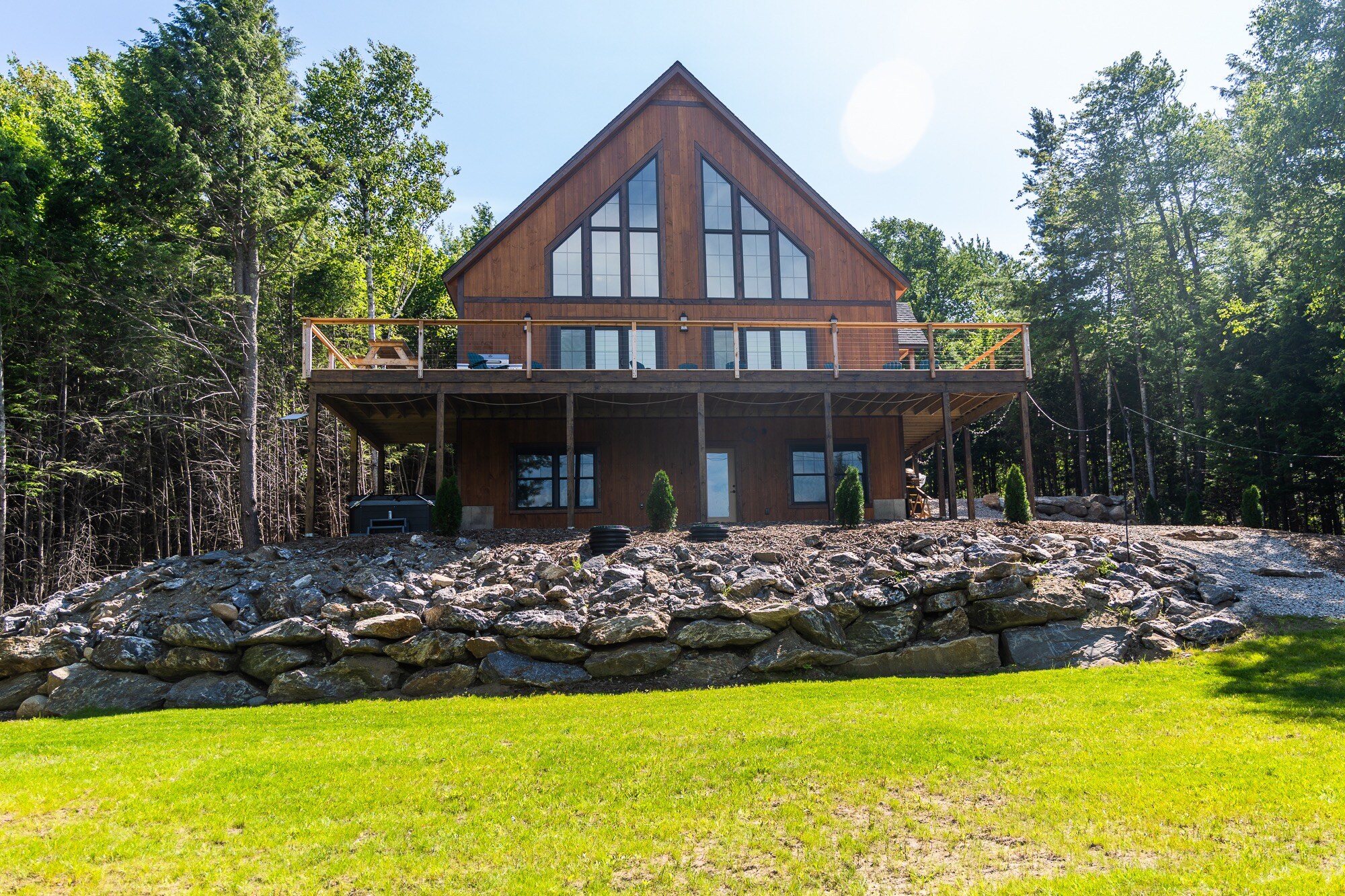The Tourmaline’s timber-clad façade and cathedral windows viewed from the lawn